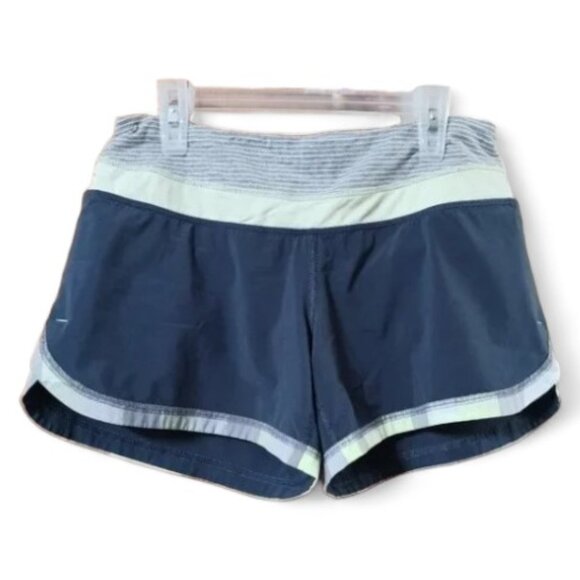 Reduced price Lululemon Wet Dry Warm  Green Neon Plaid Trim Speed Shorts  Size 4 - Picture 1 of 7